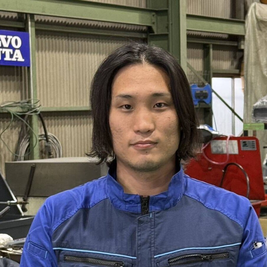 菅　哲朗